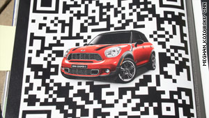 A QR code promotes Mini Cooper cars.