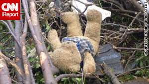 A CNN iReporter posted this photo of a teddy bear lying in debris in tornado-ravaged Tuscaloosa, Alabama.