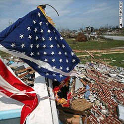 Toll rises as killer tornadoes tear across U.S. states
