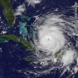 Irene batters Bahamas; East Coast braces for 'huge' storm