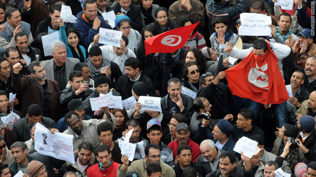 Protesters march in Tunis amid Arab League fears