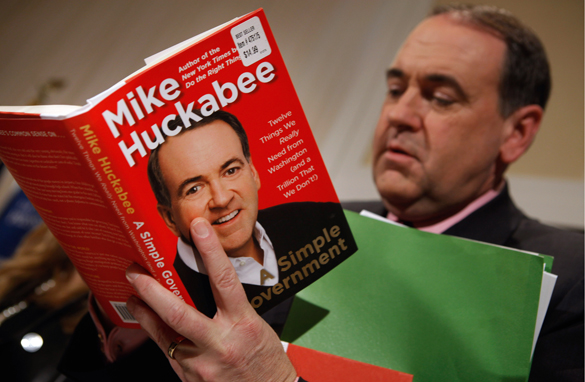 mike huckabee wife janet. Mike Huckabee signs a copy of