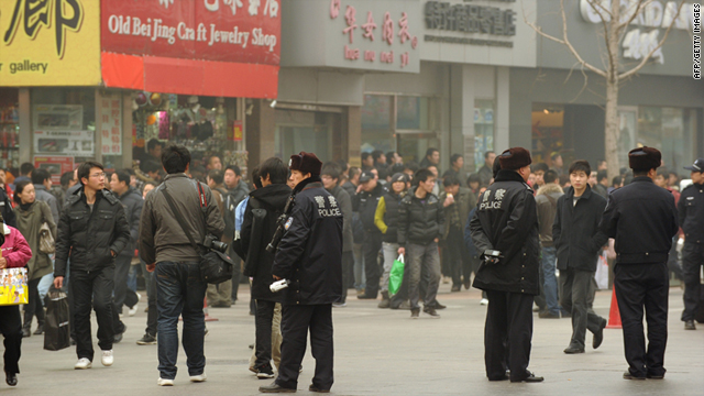 Security forces flood Beijing before protests
