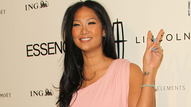 kimora lee simmons 2011 pictures. Kimora Lee Simmons reaches out