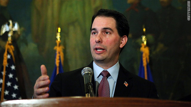 Wisconsin governor signs bargaining bill into law