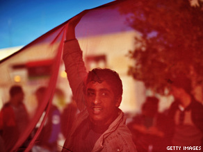 A Libyan anti-government protester takes part in an anti-Gadhafi demonstration.