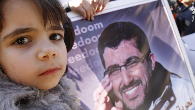 Palestinian relatives of Dirar Abu Sisi attend a Gaza demonstration calling for his release from an Israeli jail on Tuesday.