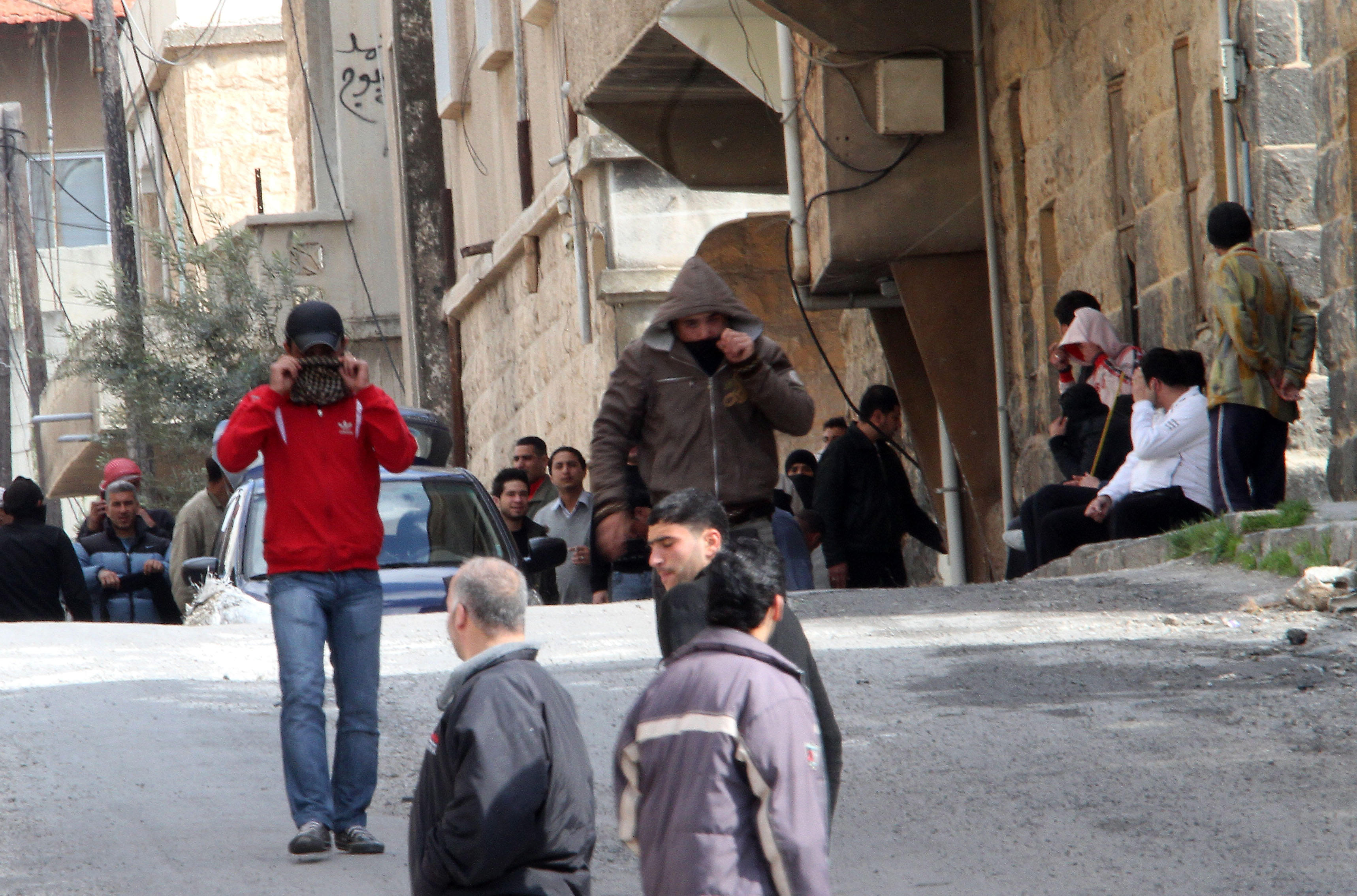 Anti-government activists gather on the streets of Daraa, 100kms south of the capital Damascus. Syrian security forces fired on anti-regime protesters near a mosque AFP/Getty Images.