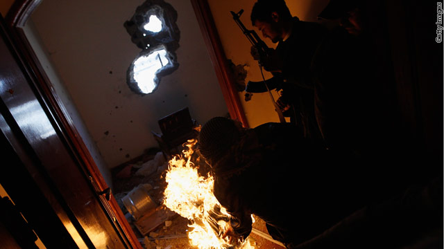 What we're watching: Thursday, April 21, 2011 Tough to topple Gadhafi...slain photographers mourned...Japan enforces evacuation zone