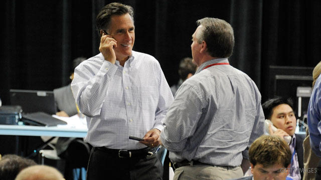 Romney signs new adviser