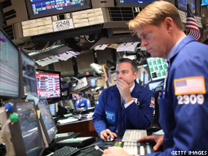 Traders work on the floor on the New York Stock Exchange.