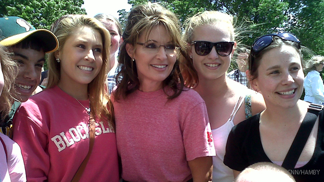 Palin attacks Romney's record on his announcement day