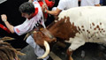 Photos: Bulls and bedlam in Pamplona