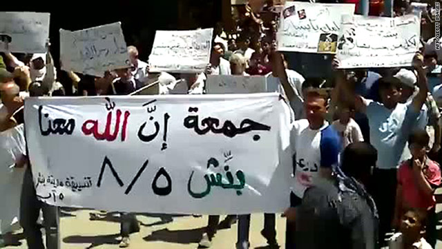 As Syria seethes, protesters chant 'God is With Us'