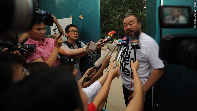 Artist Ai Weiwei back on Twitter, defiantly attacking China over jailed friends