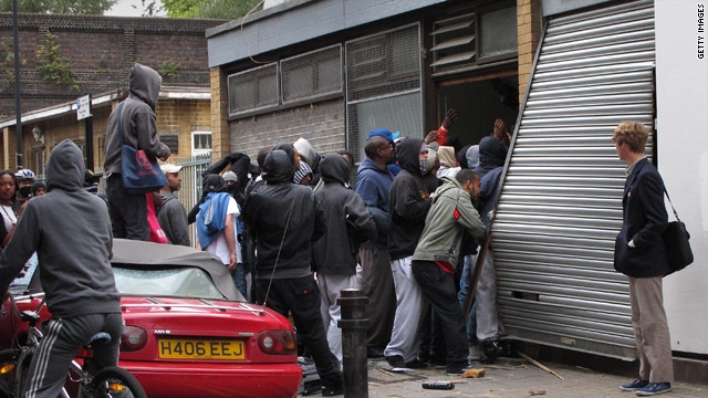 Looters pile into a store in London.