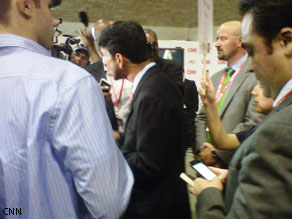 A guest producer's view of the post-debate response. Here, Louisiana Gov. Bobby Jindal is talking with reporters.