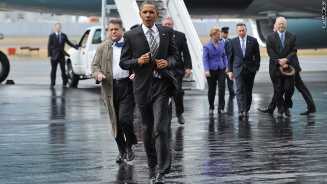 Obama takes digs at Perry, GOP debate audiences