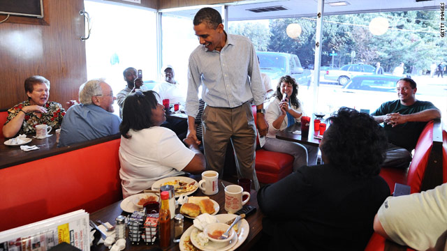 Don’t tell Michelle! Obama not eating so well on the road