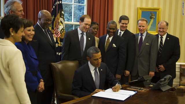 Obama signs trade agreements