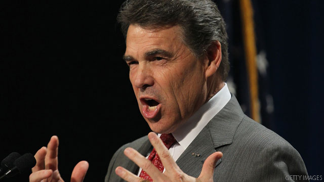 Perry jabs Cain at conservative forum in Iowa