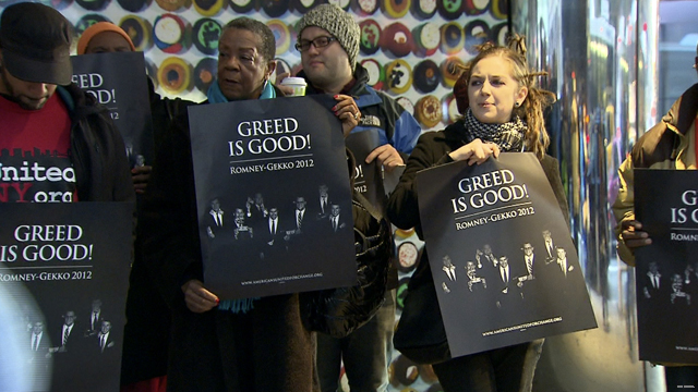 Protesters equate greed with Romney