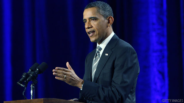Obama issues veto threat over payroll tax cut