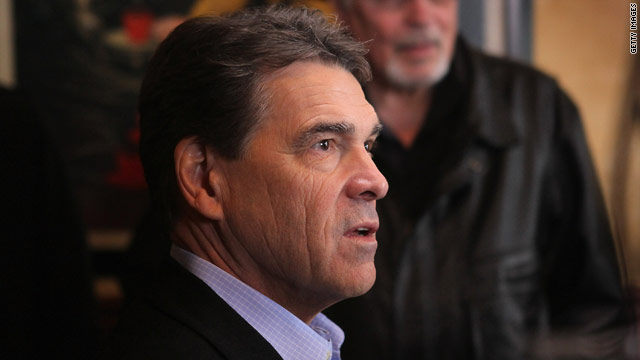 Perry: Romney and Gingrich backed the 'biggest act of theft in American history'