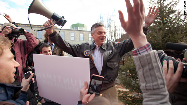 Romney, Huntsman tie in midnight New Hampshire vote