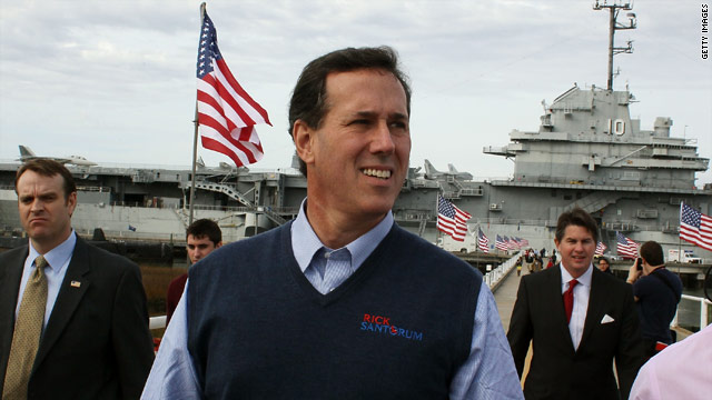 Santorum tough on Romney aboard USS Yorktown