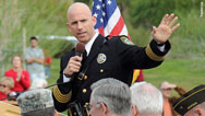 Gay sheriff quits Romney camp
