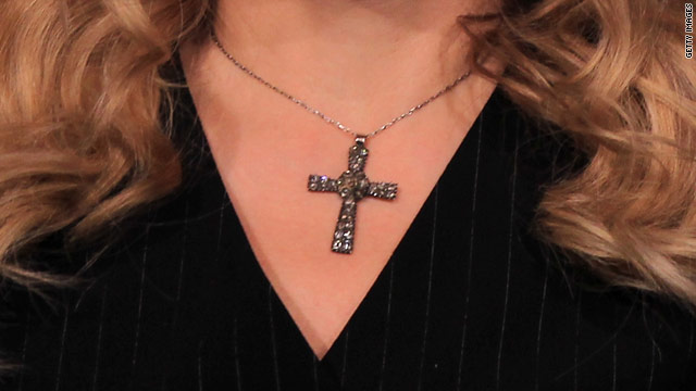 Britain fights Christians' right to wear cross, infuriating activists