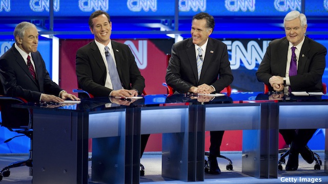 Despite long odds, Romney rivals standing firm