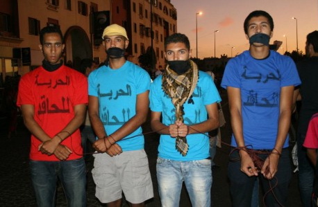 Supporters of the jailed rapper wear symbolic gags and T-Shirts saying 'Freedom for Al Haqed.' PHOTO: L7a9ed.com