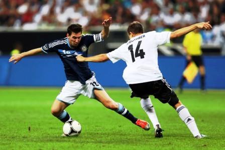 Messi (left) has scored 10 goals in six games for Argentina.