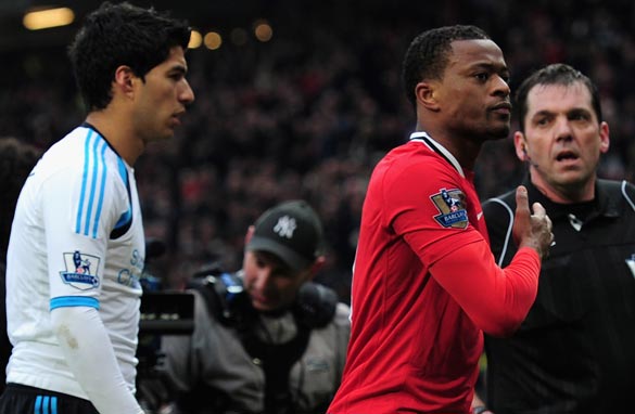 All eyes will be on Patrice Evra and Luis Suarez during Sunday's game at Anfield.