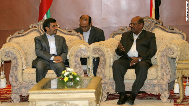 Iranian President Mahmoud Ahmadinejad (L) meets with Sudanese President Omar al-Bashir in the capital Khartoum during his official visit on September 26.