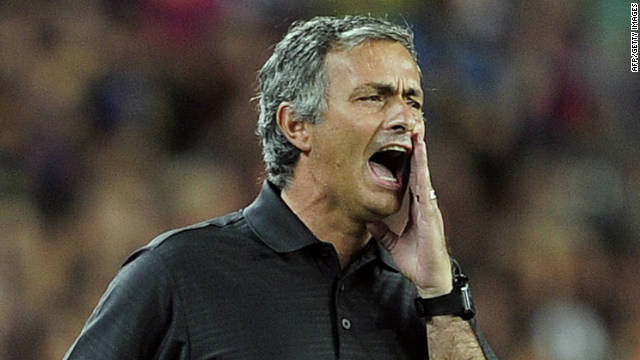 Real Madrid coach Jose Mourinho shouts during the second leg of the Spanish Super Cup at Barcelona's Camp Nou.