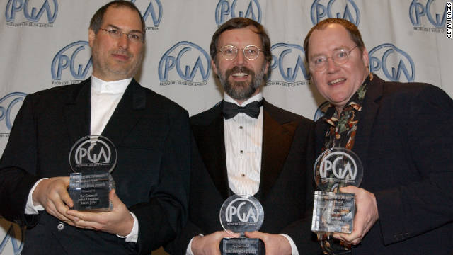 Jobs, from left, Ed Catmull and John Lasseter celebrate an award for Pixar at the 13th Annual Producers Guild Awards in March 2002 in Los Angeles.