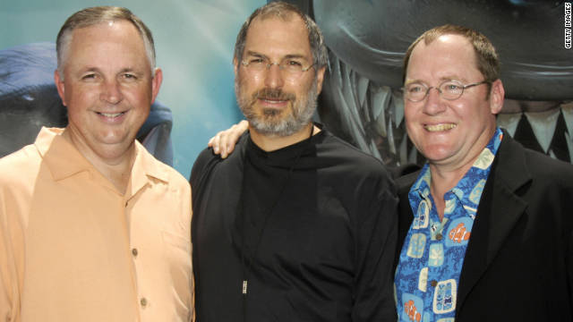 Disney's Dick Cook, Jobs and producer John Lasseter pose for photographers at the premiere of "Finding Nemo" in Hollywood on May 18, 2003. 