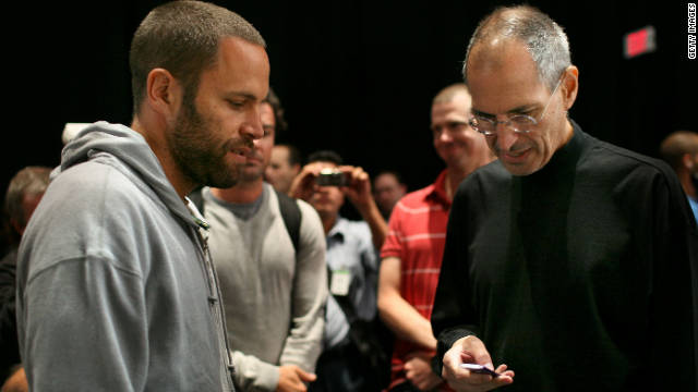 Musician Jack Johnson, left, talks with Jobs during an Apple special event in 2008 where a new version of the iPod Nano and Touch were announced.