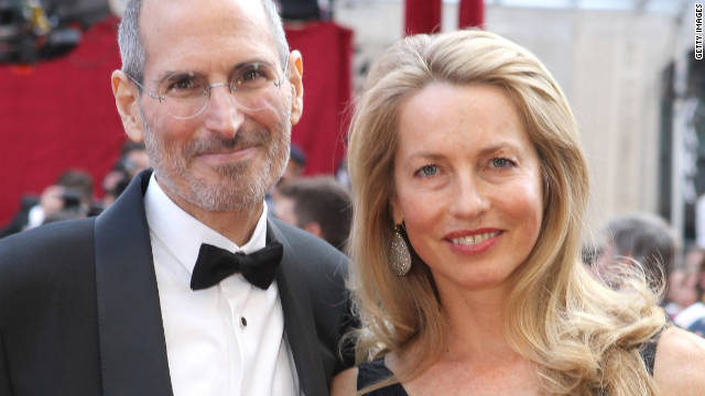 Jobs poses with his wife, Laurene Powell, at the 82nd annual Academy Awards on March 7, 2010, in Hollywood.