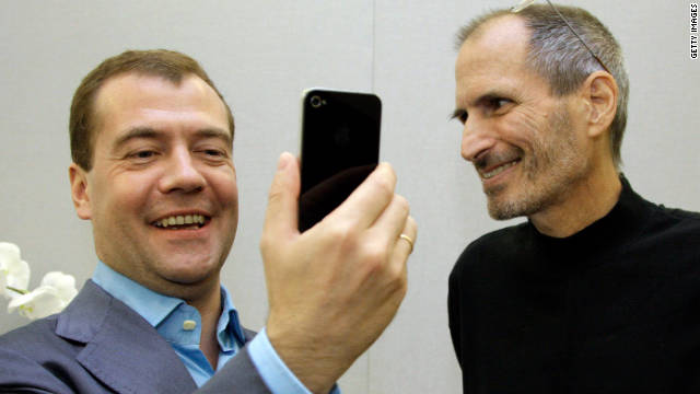 Russian President Dmitry Medvedev, left, admires his new iPhone 4 from Jobs on Medvedev's tour of Silicon Valley in June 2010.