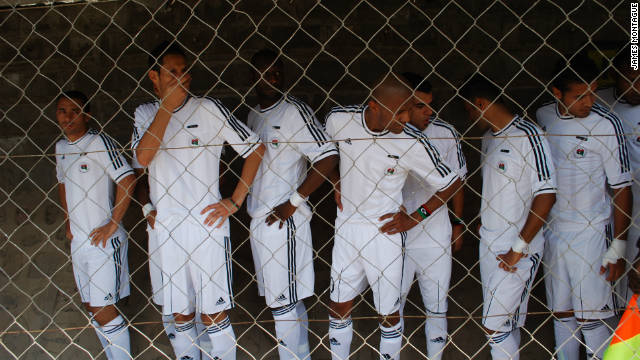 The Libya team wait nervously in the tunnel, waiting for the moment to walk out on to the pitch. There was some confusion over which of Libya's national anthems would be played. The Zambian government is yet to recognize the National Transitional Council. 