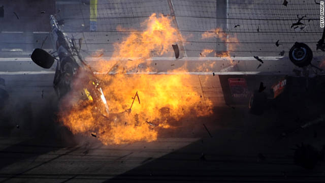 Racing vet Dan Wheldon's car bursts into flames in a multi-car wreck during the Las Vegas Indy 300 on Sunday, October 16. Wheldon, 33, was killed.