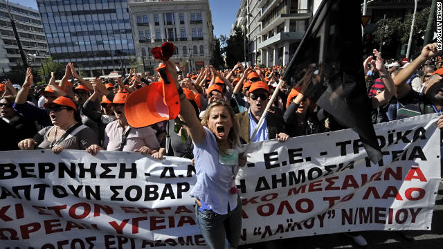 Health workers demonstrate in Athens ahead of a vote in Parliament on a new bill to stave off bankruptcy.