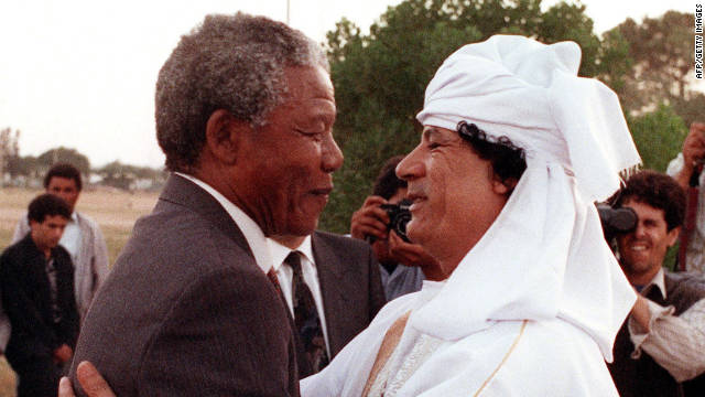 Nelson Mandela, then president of the South African National Congress, greets Gadhafi in Tripoli in May 1990.