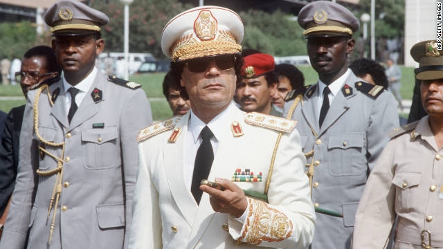 Gadhafi reviews troops on an official visit to Senegal in December 1985. 