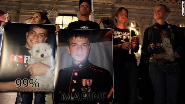 A vigil is held for Marine Lance Cpl. Scott Olsen, who was injured during an Occupy movement protest in California.