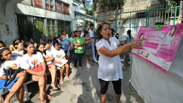  A Philippine health worker discusses family planning with a class of pregnant women in suburban Manila this year.